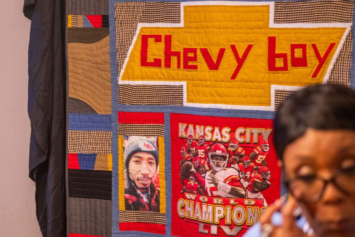 Laurie Bey, mother to Cameron Lamb, talked while in front of a quilt featuring her son and his interests, at her home in Kansas City on Monday, July 21, 2025.
