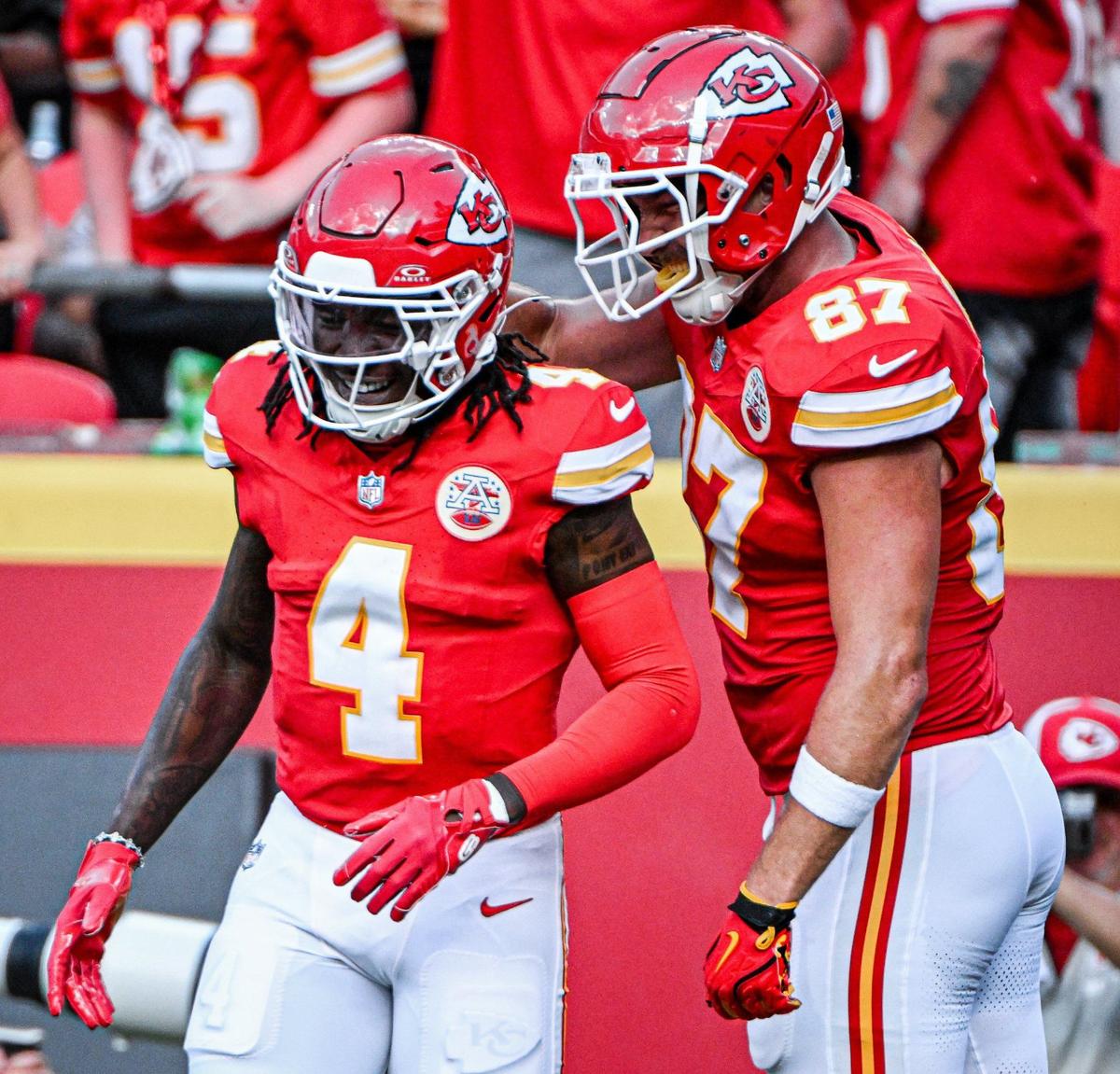 Kansas City Chiefs tight end Travis Kelce (87) congratulates wide receiver Rashee Rice (4) after Rice ran in a touchdown on a reception in the second quarter against the Cincinnati Bengals Sunday, Sept. 15, 2024, at GEHA Field at Arrowhead Stadium.