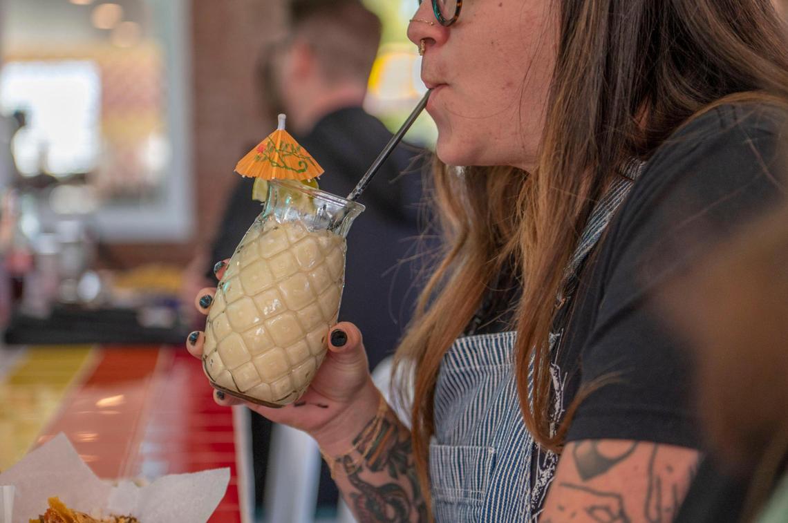 Customers can enjoy cocktails at Tiki Taco.