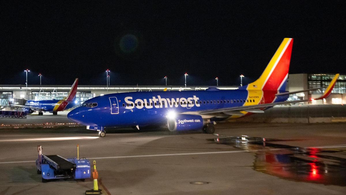 A Southwest Airlines Boeing 737-700 airliner taxis to a runway from gate 34 of terminal B as the final flight from Kansas City International Airport’s old terminals on Monday, Feb. 27, 2023, in Kansas City.