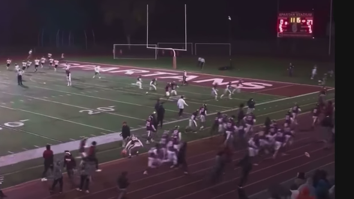 High school football players sprinted off the field following a shooting outside the stadium on Friday, Sept. 23.