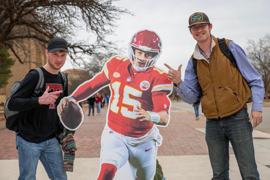 Texas Tech University students Colter Pohlman, left, and Evan Shannon pose for a photo next to a life-size cutout featuring Kansas City Chiefs quarterback Patrick Mahomes at Texas Tech University on Tuesday, Feb. 6, 2024, in Lubbock, Texas.