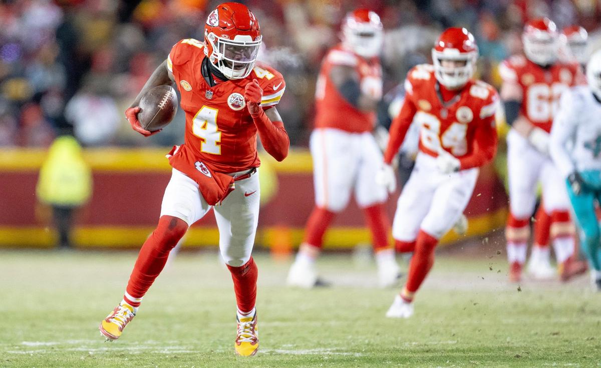 Kansas City Chiefs wide receiver Rashee Rice (4) runs with the ball against the Miami Dolphins during an AFC Wild Card game at GEHA Field at Arrowhead Stadium on Saturday, Jan. 13, 2024, in Kansas City.