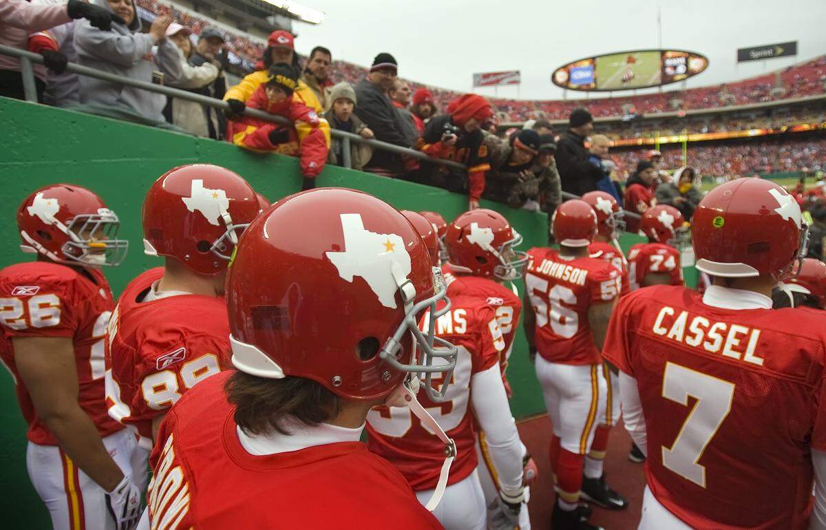 The Kansas City Chiefs wore the uniforms and helmet logos of the Dallas Texans, honoring the 50th year of the AFL’s inception, in their game against the Dallas Cowboys on Sunday, October 11, 2009 at Arrowhead Stadium in Kansas City, Mo. Quarterback Brodie Croyle is at foreground center.