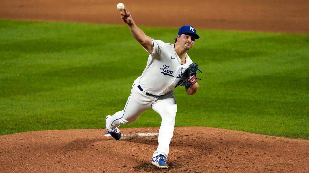 Kansas City Royals starting pitcher Jonathan Heasley throws during the second inning of a baseball game against the Seattle Mariners Friday, Sept. 17, 2021, in Kansas City, Mo. (AP Photo/Charlie Riedel)