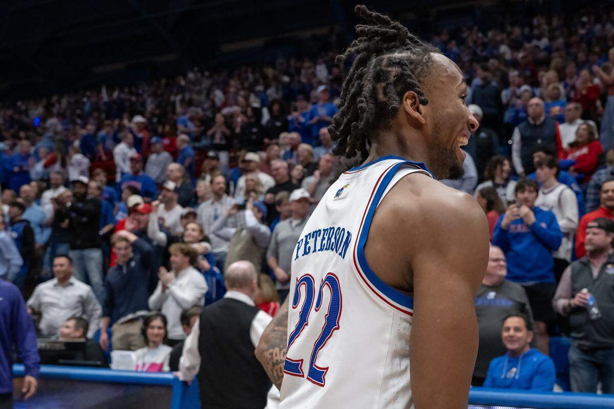 Kansas Jayhawks guard Darryn Peterson (22) was all smiles after the Jayhawks defeated TCU, 104-100 in overtime at Allen Fieldhouse in Lawrence on Tuesday, Jan. 6, 2025.