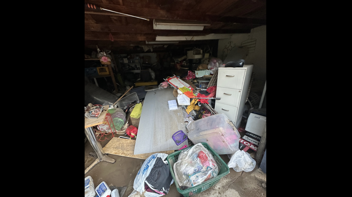 Damage to the Peña home following flash floods in the Kansas City metro. The family suffered heavy losses of personal belongings, as well as inventory for their small businesses.