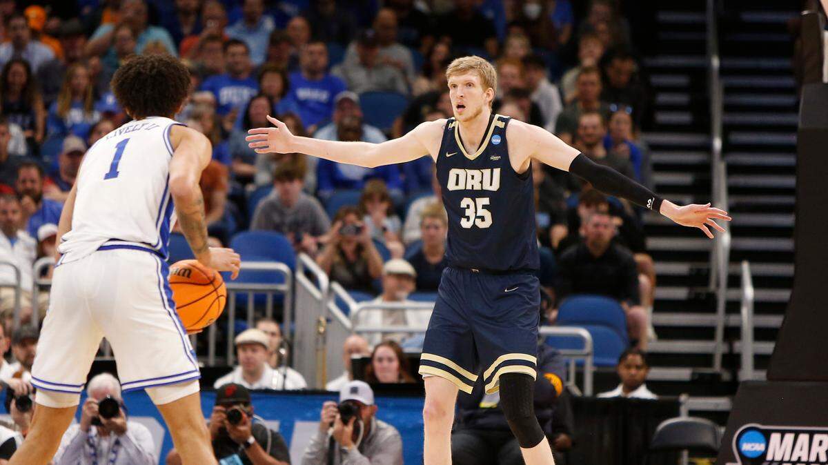 Oral Roberts forward Connor Vanover (35) defends Duke Blue Devils center Dereck Lively II during the first half at Amway Center in Orlando, Florida, on March 16, 2023.