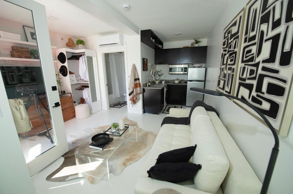 A full view of a 320-square-foot model studio, the first finished of 48 inside the steel shipping container complex rising at 31st and Summit streets.