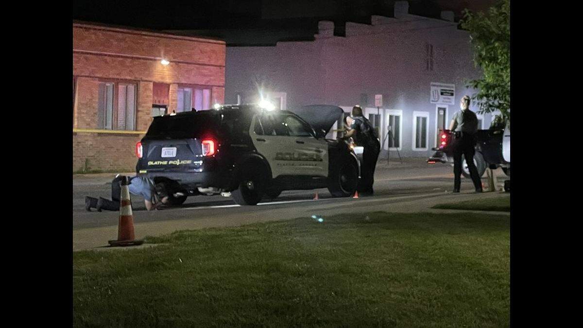 Two officers fired their hand guns and killed a man who approached police with a knife as they were conducting a traffic stop, said Sgt. Joel Yeldell, a spokesman for the Olathe Police Department.