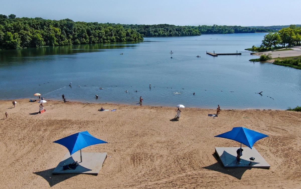 During the summer, lifeguards monitor the swimmers at Shawnee Mission Park Beach.