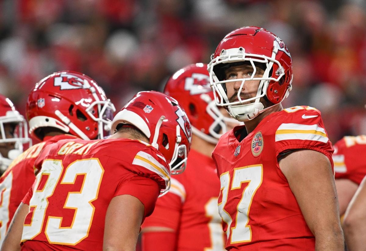 Kansas City Chiefs tight end Travis Kelce (87) looks up from the huddle while playing the Las Vegas Raiders on Friday, Nov. 29, 2024, at GEHA Field at Arrowhead Stadium.