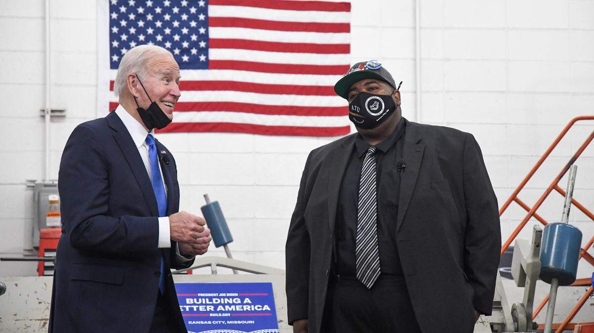 President Joe Biden meets with Kansas City Area Transportation Authority employee and Amalgamated Transit Union Local 1287 president Will Howard Wednesday before giving his presentation on infrastructure at the KCATA headquarters.