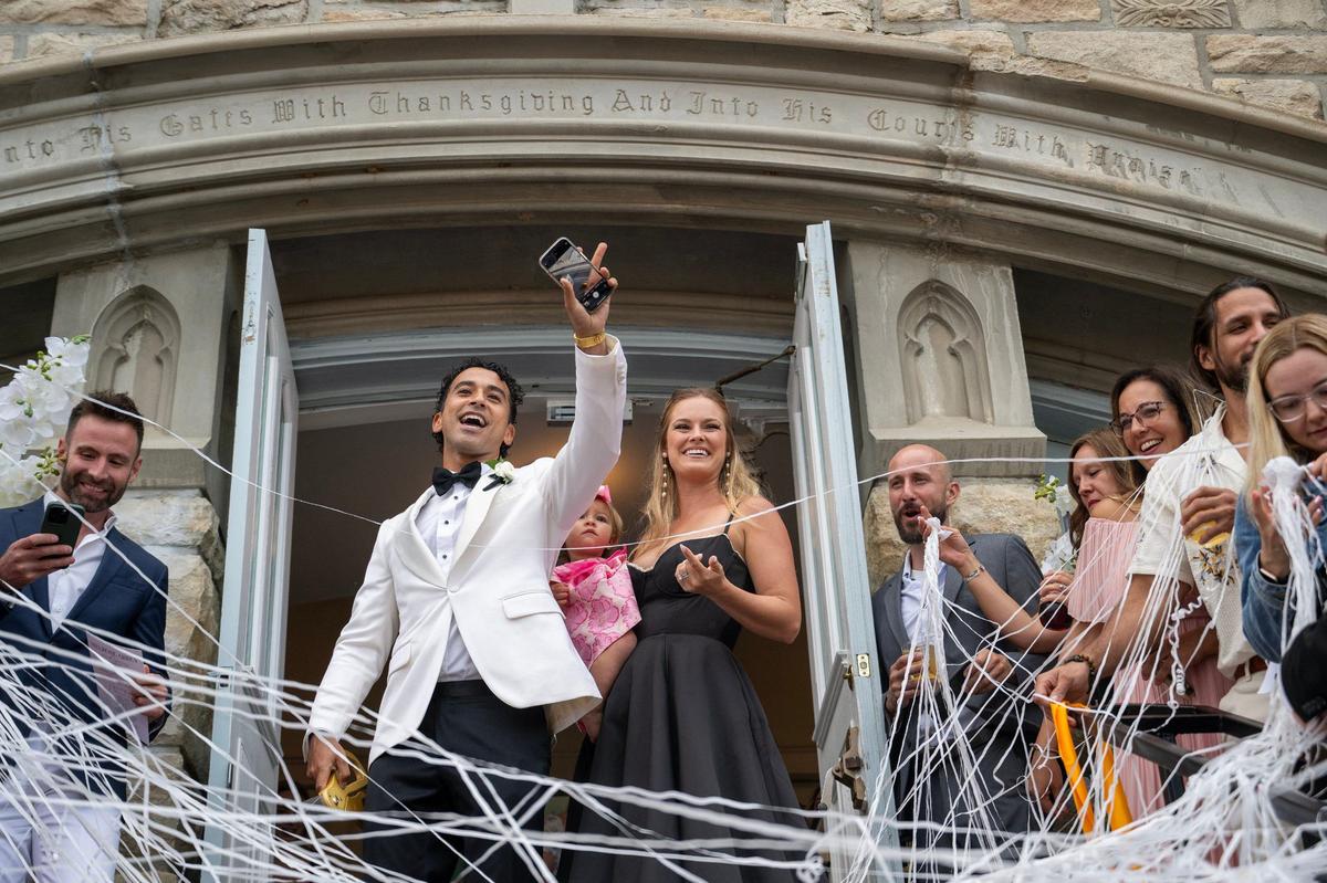 Johnny and Abbey Youssef with daughter Laney celebrate the grand opening of Melrose Abbey with friends and family. The Youssefs spent nearly two years and $3 million renovating the long-empty 102-year-old former Broadway Baptist Church at Broadway Boulevard and 39th Terrace.