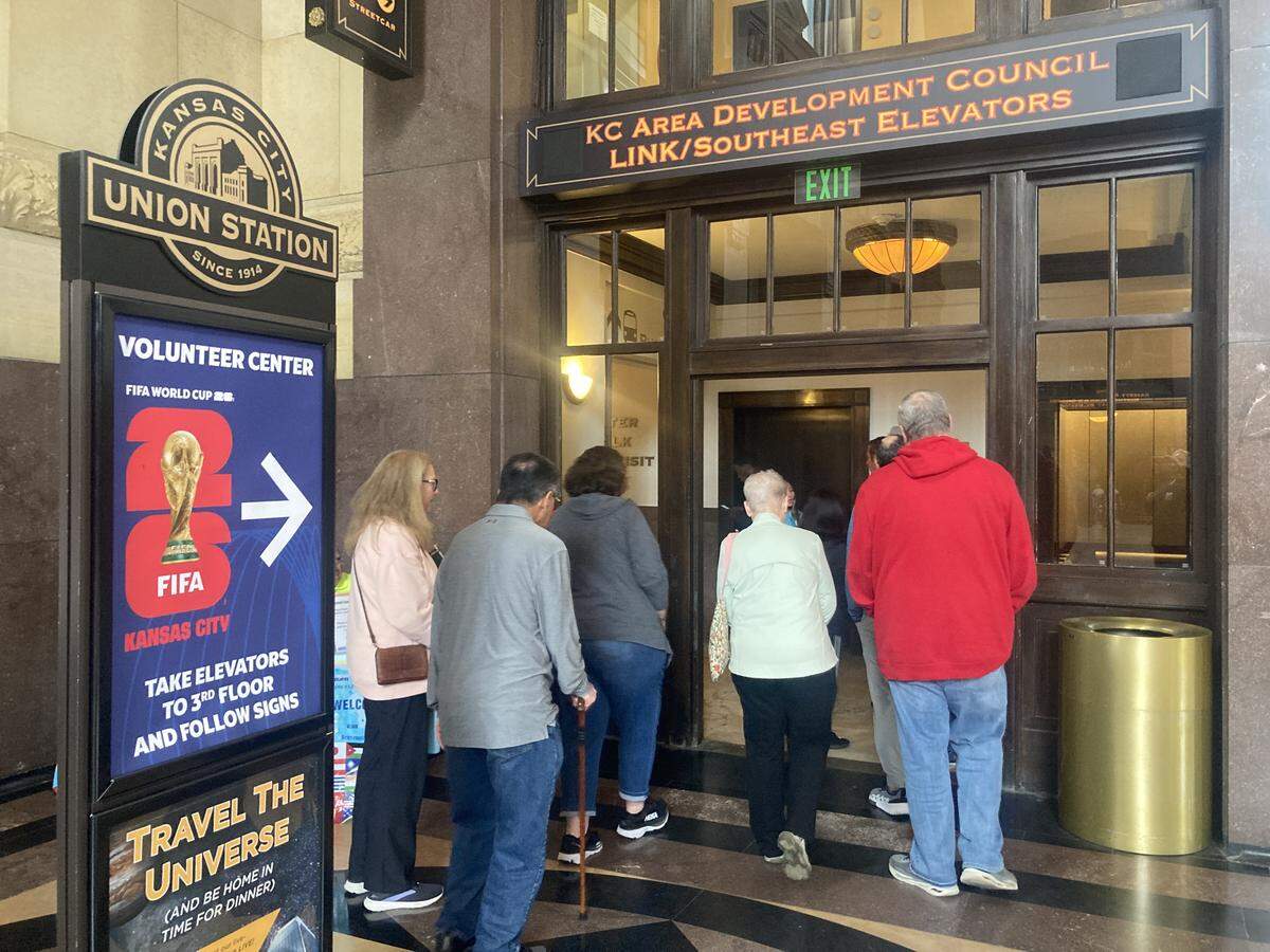 At Union Station, World Cup volunteers on Tuesday head to the elevator to be escorted to a noon training.