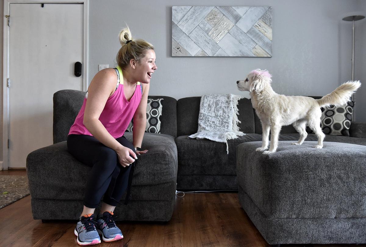 Hough recently had fun with her dog, Miley, before going to the gym to work out.