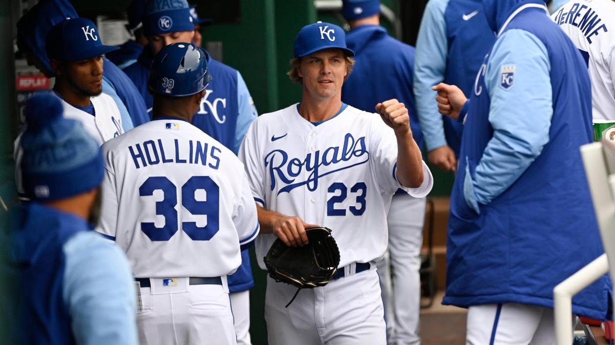 Royals pitcher Zack Greinke (23) is congratulated after starting and giving up a single run in KC’s season opener against the Cleveland Guardians on Thursday at The K.