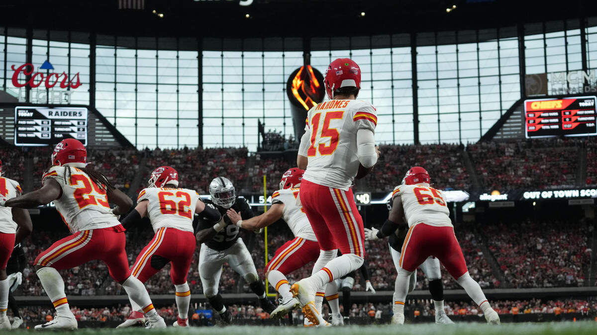 Kansas City Chiefs quarterback Patrick Mahomes drops back to pass against the Las Vegas Raiders during a Sunday, Oct. 27, 2024, NFL Week 8 game at Allegiant Stadium in Paradise, Nevada.