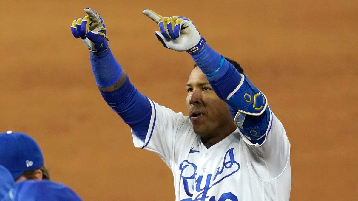 Kansas City Royals’ Salvador Perez celebrates after hitting a walk-off single during the ninth inning of a baseball game against the Tampa Bay Rays Wednesday, April 21, 2021, in Kansas City, Mo. The Royals won 9-8. (AP Photo/Charlie Riedel)