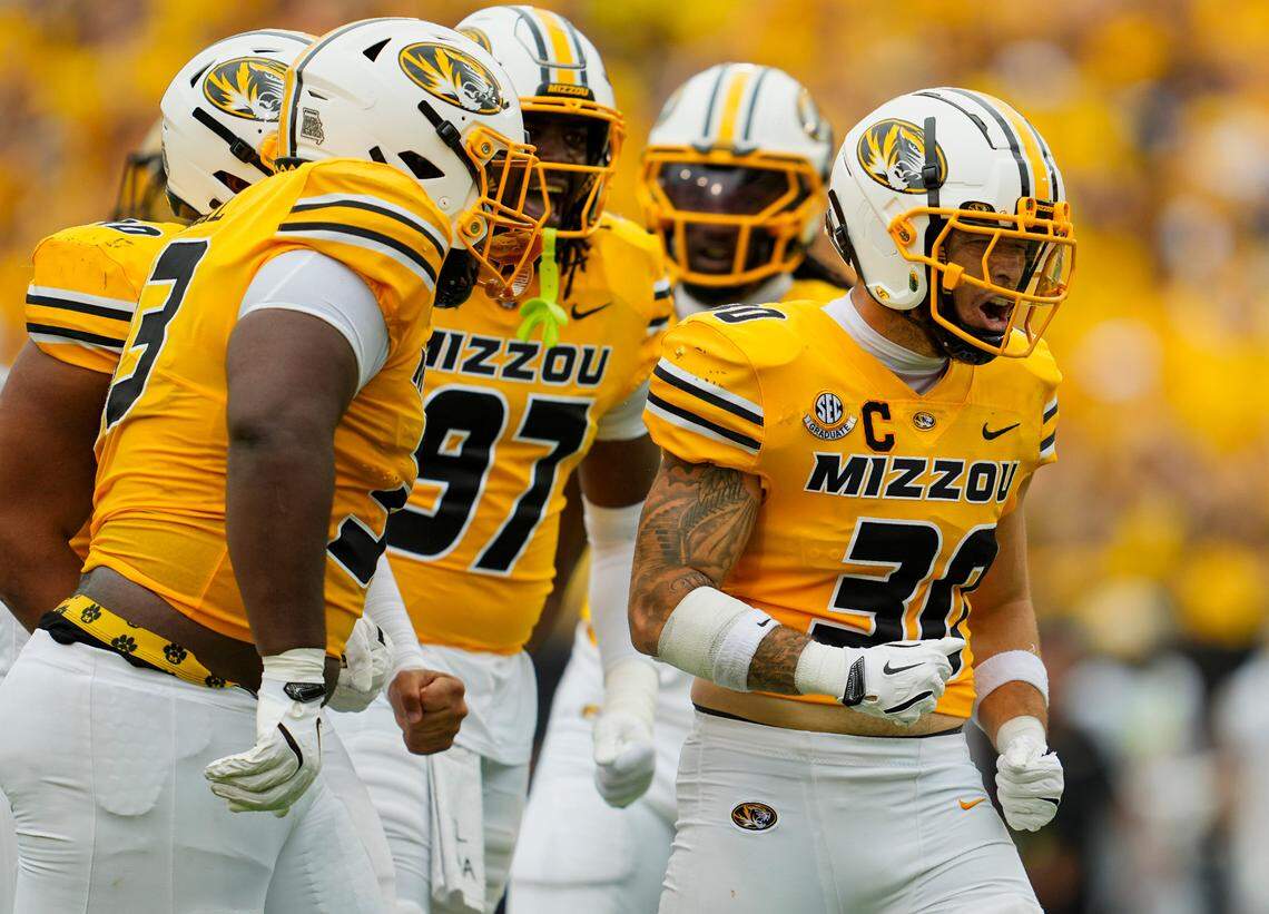 Missouri Tigers linebacker Chuck Hicks (30) celebrates with teammates after a sack during the first half against the Vanderbilt Commodores at Faurot Field at Memorial Stadium on Sept. 21, 2024.