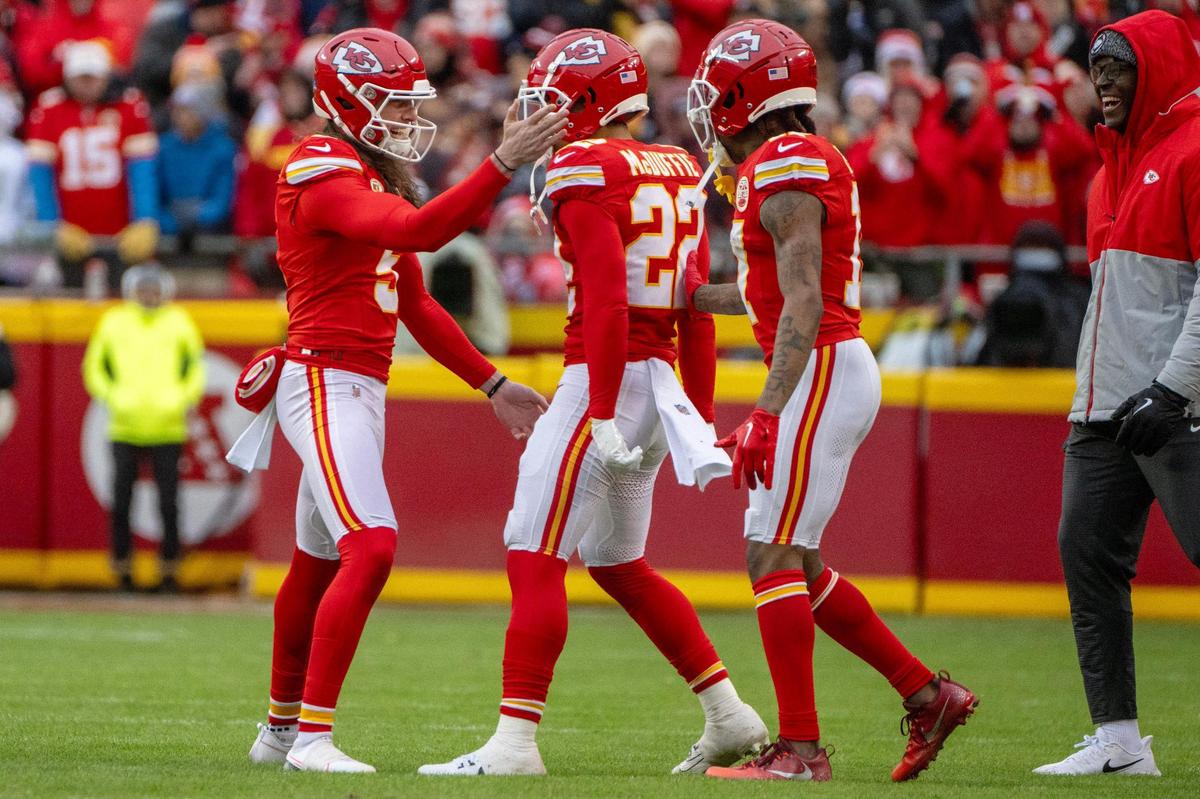 Kansas City Chiefs punter Tommy Townsend (5), left, celebrates a fake punt with teammate Kansas City Chiefs cornerback Trent McDuffie (22) during the second quarter in an NFL football game against the Los Vegas Raiders at GEHA Field at Arrowhead Stadium on Monday, Dec. 25, 2023, in Kansas City.