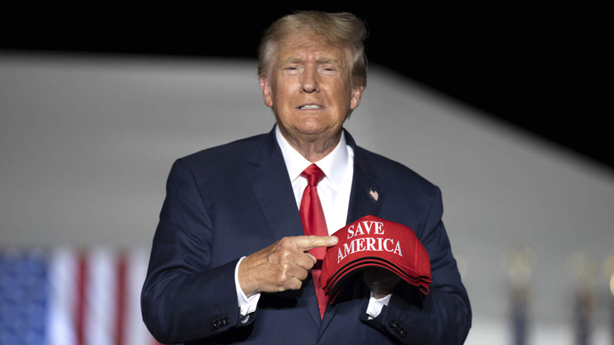 Former President Donald Trump makes his entrance at a rally at the Minden Tahoe Airport in Minden, Nev., Saturday, Oct. 8, 2022. (AP Photo/José Luis Villegas, Pool)