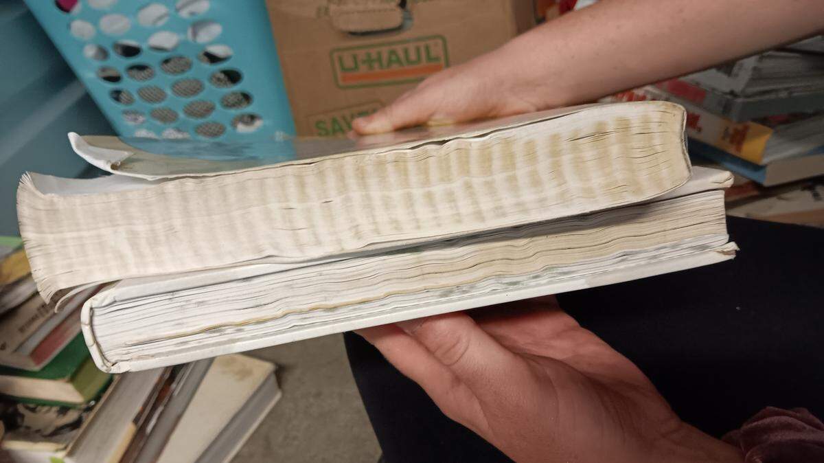 Shelbi Hussong’s collection of more than 1,000 books were damaged by water while stored at a Kansas City Public Storage facility. The company told tenants a July 4 rain storm flooded the unit. Provided photo.