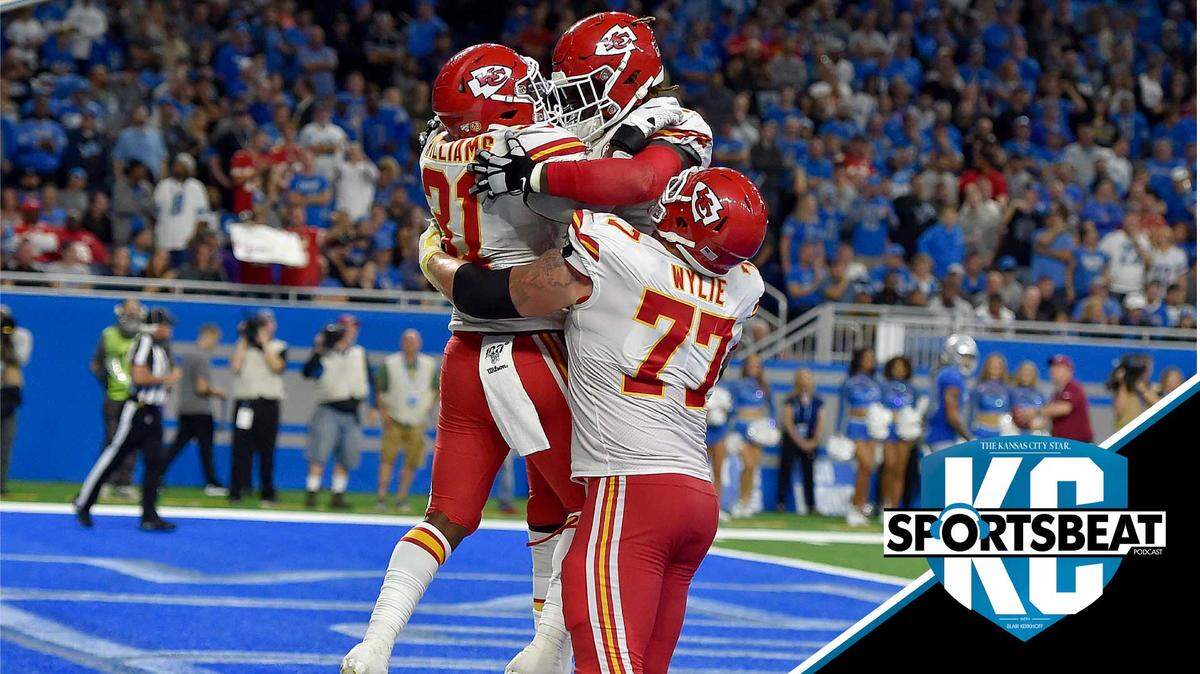 Chiefs running back Darrel Williams, tackle Cameron Erving and guard Andrew Wylie celebrate Williams’ fourth-quarter touchdown Sunday in Detroit.
