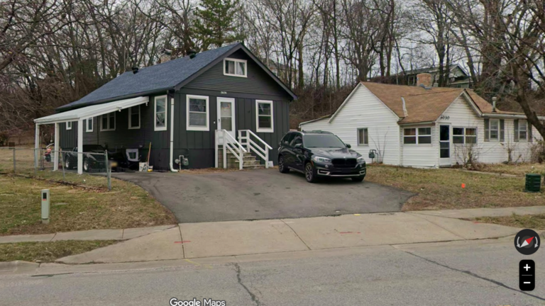 Why does this Johnson County city own a cluster of single-family homes?