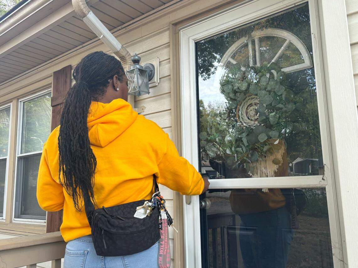 Rep. Jamie Johnson knocks on doors in Platte County ahead of the Nov. 5 election.