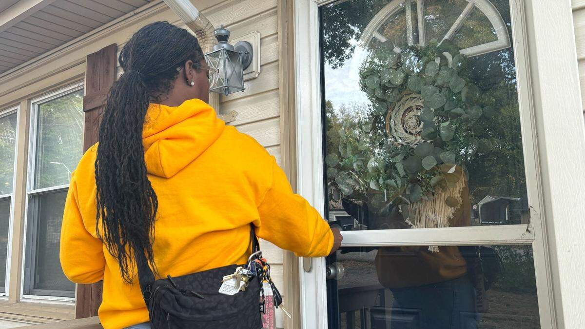 Rep. Jamie Johnson knocks on doors in Platte County ahead of the Nov. 5 election.