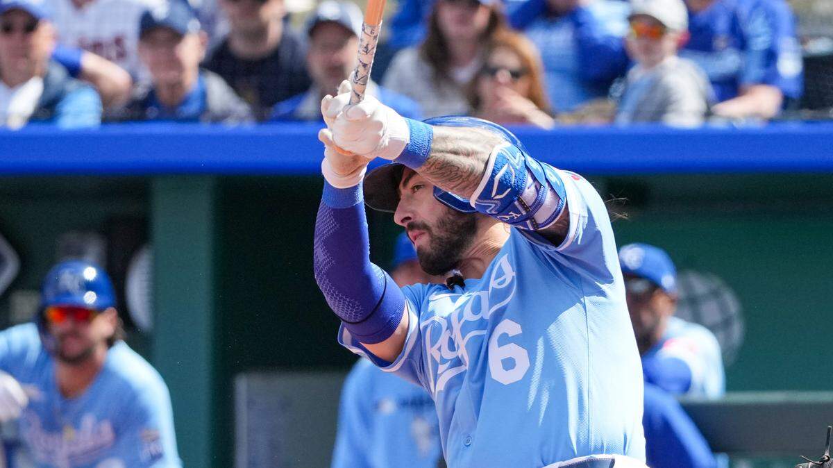Kansas City Royals third baseman Jonathan India (6) hits a one run single against the Minnesota Twins in the seventh inning at Kauffman Stadium.