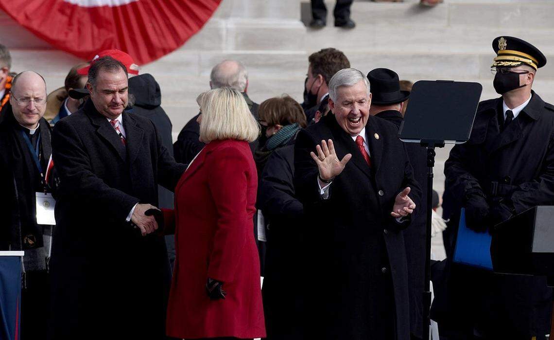 Missouri Lt. Gov. Mike Kehoe, left, congratulates First Lady Teresa Parson following the 2021 inaugural ceremonies in Jefferson City.