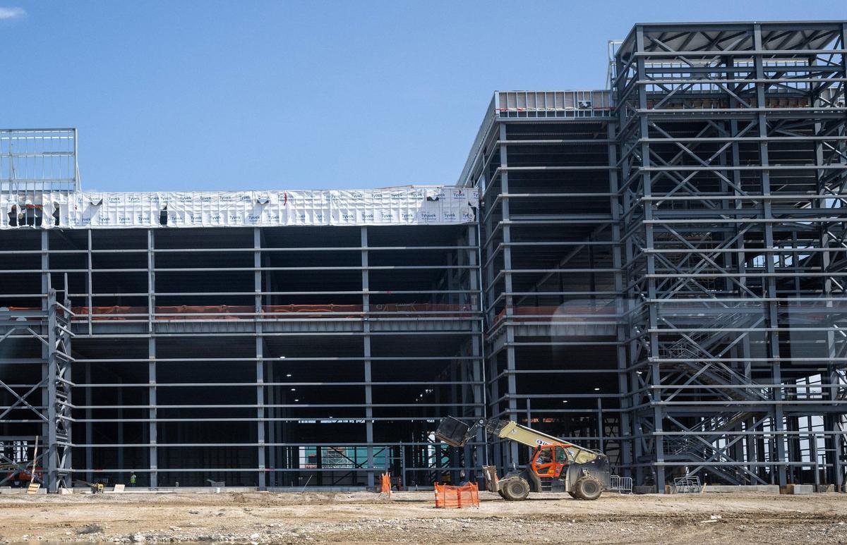Construction of the second wing of Panasonic’s new electric vehicle battery plant seen Thursday during a tour of the construction site to members of the media.