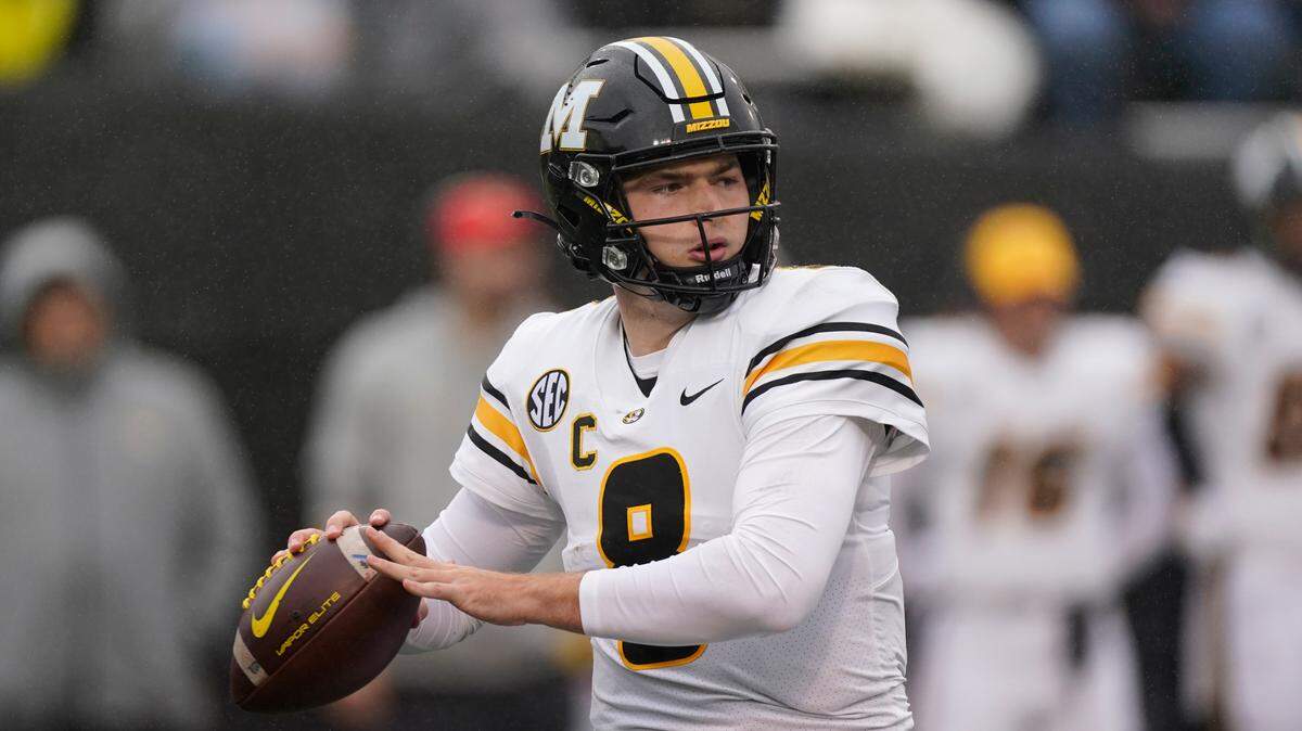 Missouri quarterback Connor Bazelak plays against Vanderbilt in the first half of an NCAA college football game Saturday, Oct. 30, 2021, in Nashville, Tenn. (AP Photo/Mark Humphrey)