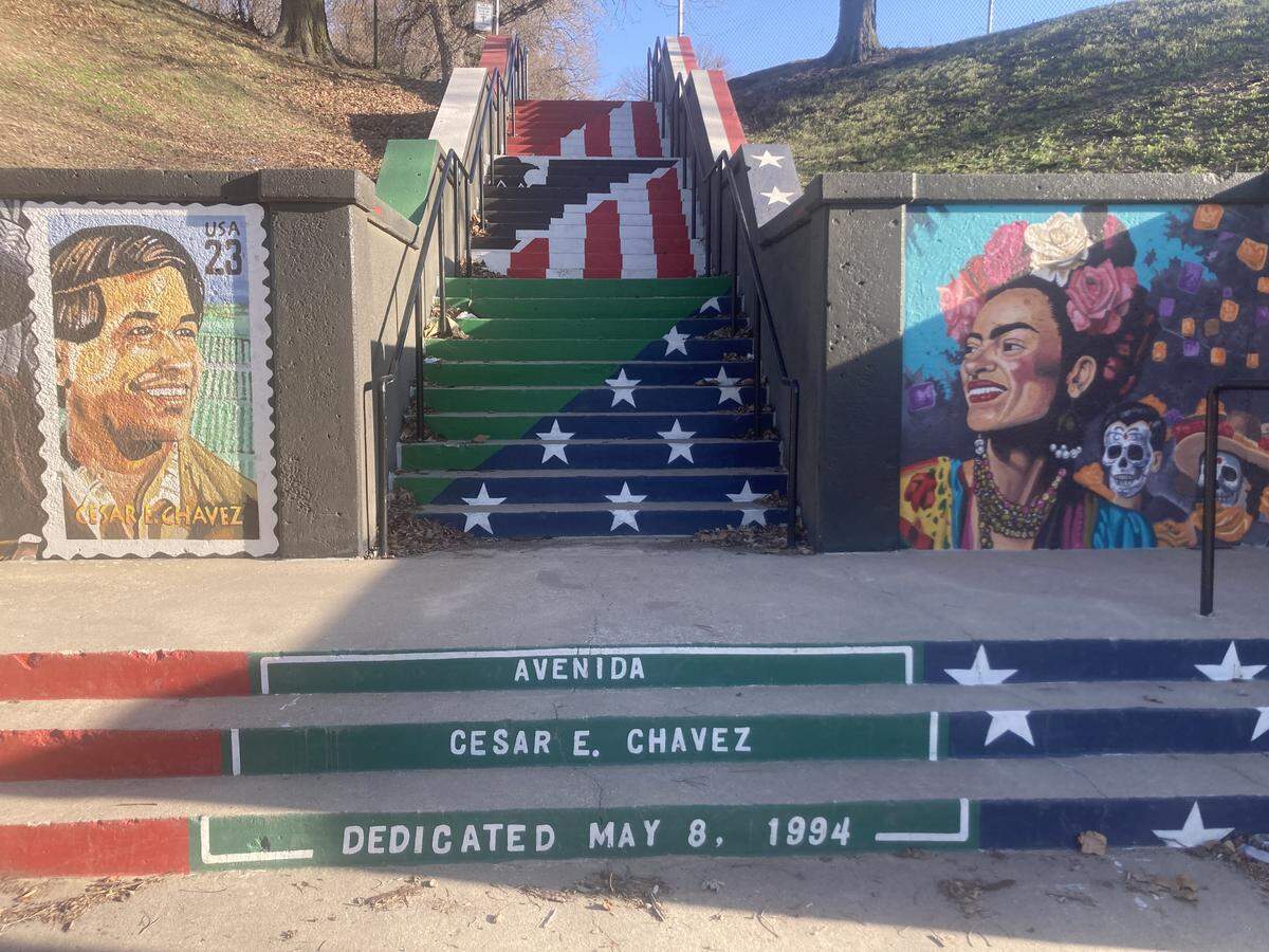 A mural of Cesar E. Chavez adorns the concrete steps leading to Gage Park from Avenida Cesar E. Chavez on Kansas City’s West Side.