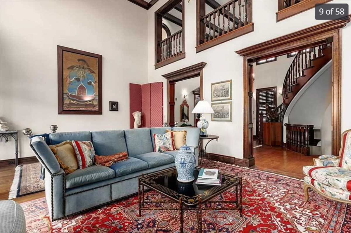 One living area inside the home for sale at 11409 Meadow Lane in Leawood is seen in this listing photo.