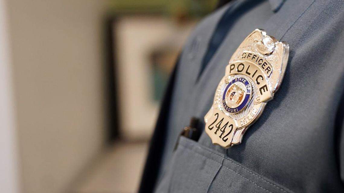 A Kansas City Police Department officer's badge on a uniform