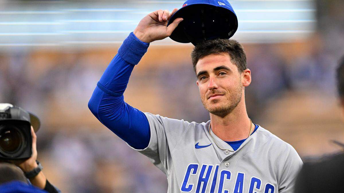 Chicago Cubs center fielder Cody Bellinger (24) acknowledges the crowd during a video tribute prior to the game against the Los Angeles Dodgers at Dodger Stadium.