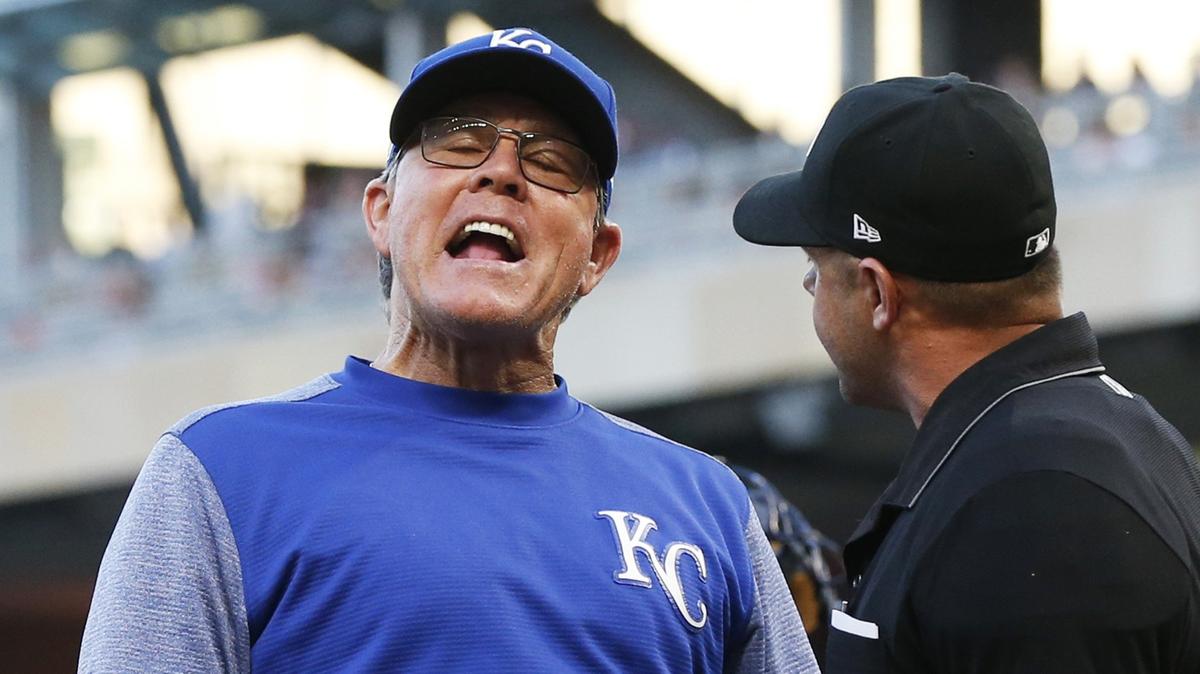 Kansas City Royals manager Ned Yost, left, yells at plate umpire Ted Barrett after Barrett threw Yost out in the fourth inning of a baseball game Monday, July 9, 2018, in Minneapolis.