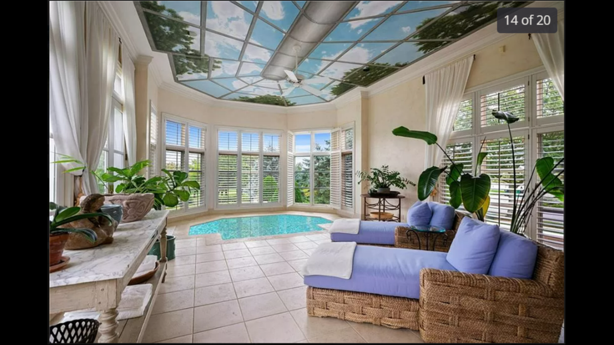 Inside the house is a private resort-style spa, with a view of the backyard.