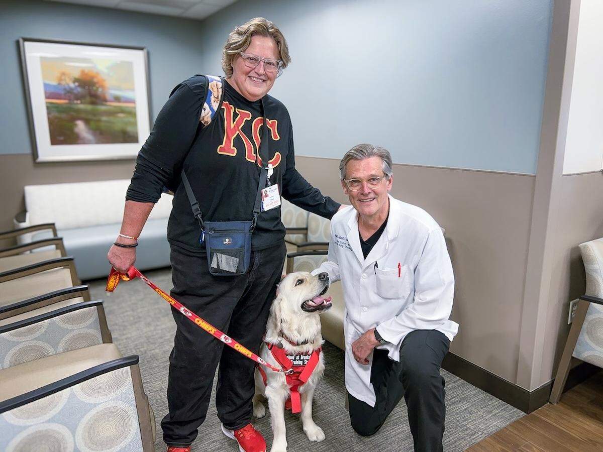 Nina Noe, KC and Dr. John Shook (Nina’s surgeon for her breast cancer) pictured at KC’s meet and greet at St. Luke’s East Breast Cancer Center in April 2024.