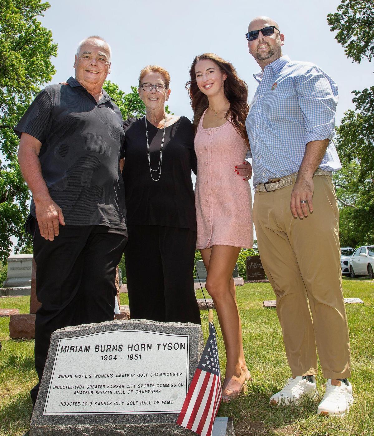 Family of golfer Miriam Burns Horn Tyson, at one time the best women’s golfer in the world, gathered around her gravestone, Friday, May 30, 2025, during a special ceremony at Forest Hill Calvary Cemetery in Kansas City. (Left to right) Keith Tyson, grandson of Burns, his wife Lori Tyson, Ashley Tyson, Burn’s great granddaughter and Kenny Tyson, Burns’ great grandson.