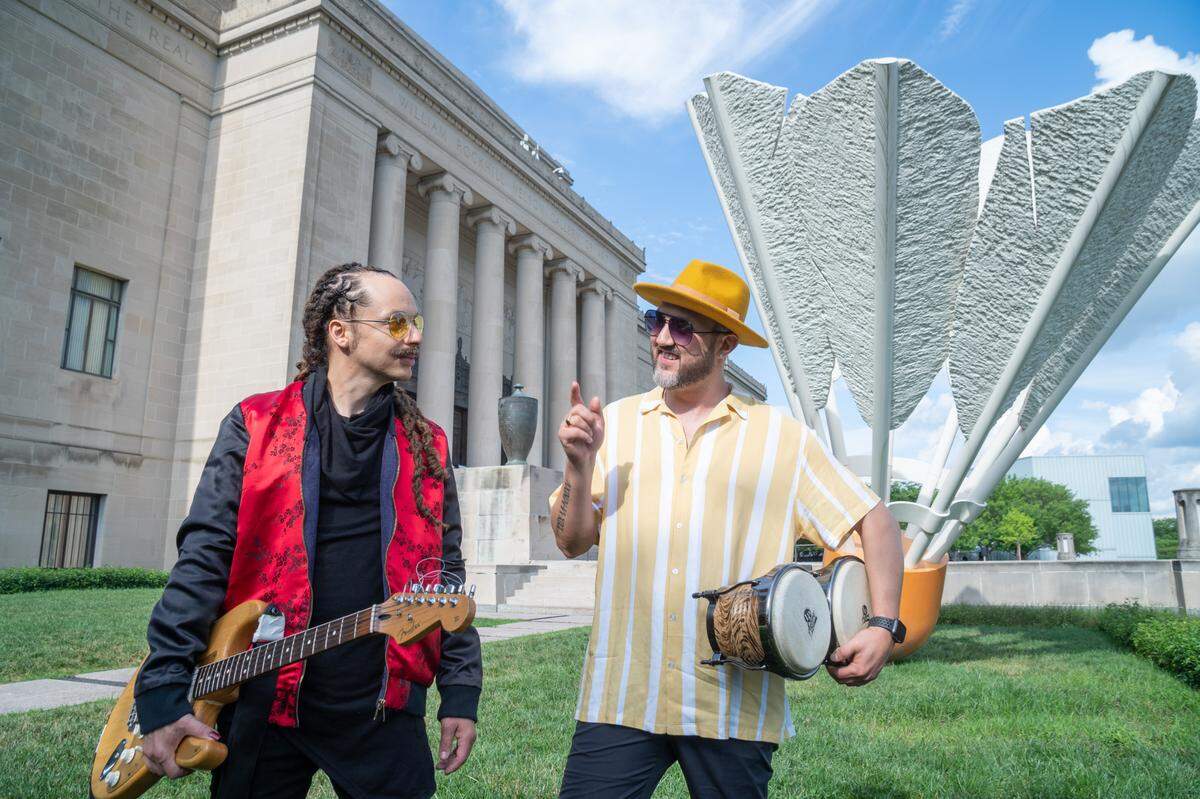 Enrique Chi and Juan-Carlos Chaurand of the band Making Movies perform in Kansas City Repertory Theatre’s “Ghost Light: A Haunted Night of Songs and Stories From KC’s Cultural Crossroads” on the Nelson-Atkins Museum south lawn.