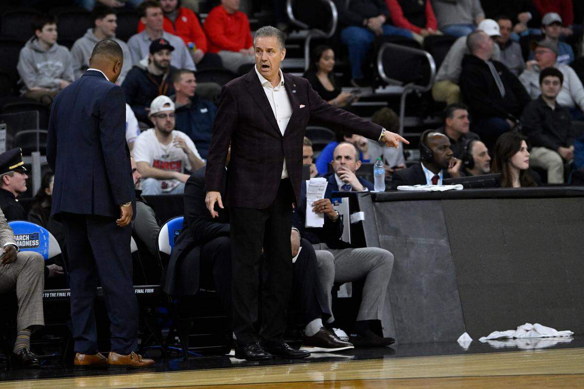 Arkansas Razorbacks coach John Calipari calls out a play during a first-round NCAA Tournament men’s basketball game at Amica Mutual Pavilion in Providence, Rhode Island, on Thursday, March 20, 2025.