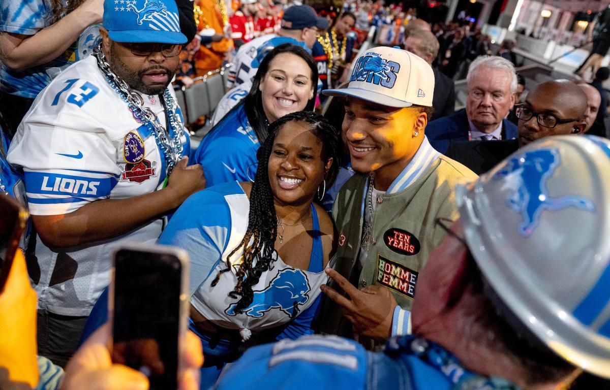 Alabama defensive back Brian Branch poses for photos with fans after being picked 45th overall by the Detroit Lions during the second round of the NFL Draft outside of Union Station on Friday, April 28, 2023, in Kansas City.