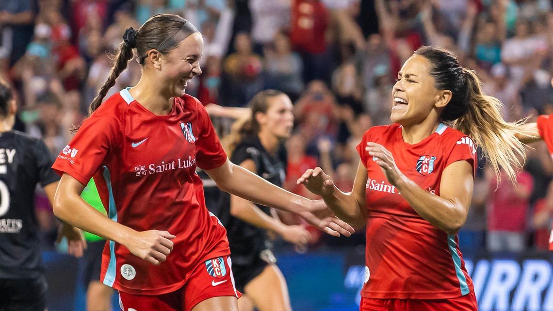 KC Current midfielder Lo’Eau LaBonta, right, celebrates with teammate Kate Del Fava after converting a penalty kick for the tying goal during a game against Angel City FC this season at Children’s Mercy Park.