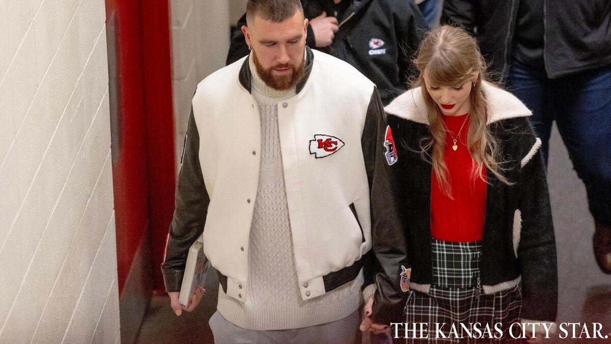 Pop star Taylor Swift holds hands with boyfriend and Kansas City Chiefs tight end Travis Kelce as they leave Arrowhead Stadium on Christmas Day. Fans expect and hope to see the pop star back at Arrowhead on New Year’s Eve.