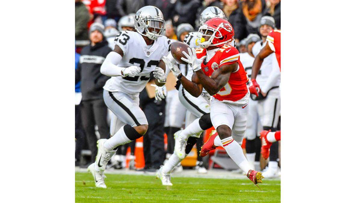 Kansas City Chiefs wide receiver Tyreek Hill caught a touchdown pass in front of Oakland Raiders cornerback Nick Nelson in the first quarter in Kansas City. It was Chiefs quarterback Patrick Mahomes’ 49th touchdown pass of the 2018 regular season.