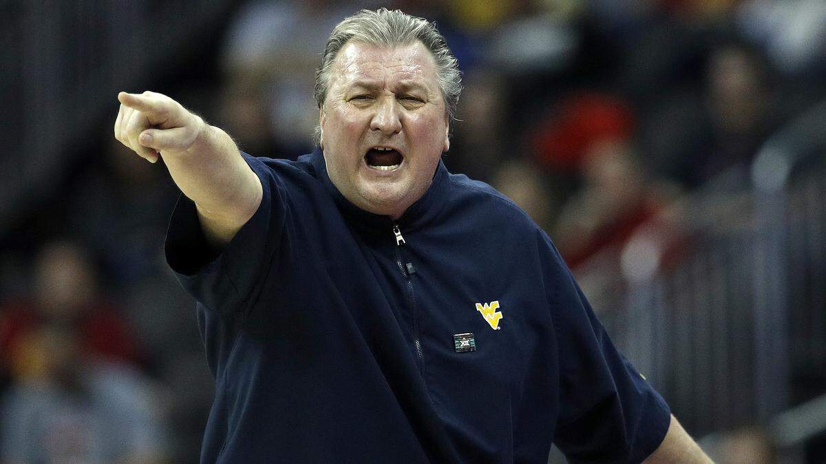 West Virginia coach Bob Huggins screams during a 2018 game.